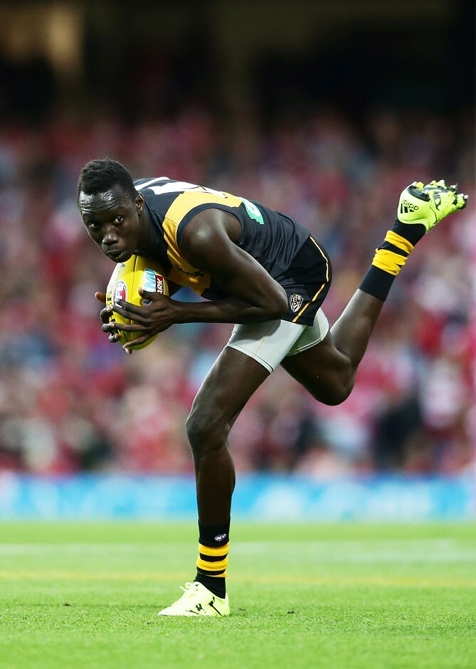 AFL 2016 Rd 23 - Sydney v Richmond SYDNEY, AUSTRALIA - AUGUST 27: Mabior Chol of the Tigers runs during the round 23 AFL match between the Sydney Swans and the Richmond Tigers at Sydney Cricket Ground on August 27, 2016 in Sydney, Australia. (Photo by Matt King/Getty Images/AFL Media)